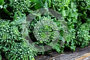 Brocoli babe bunch on wooden table