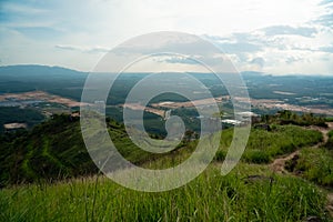 Broga Hill mountain path summer landscape. High hills covered with green grass and rocks. Broga Hill, Malaysia