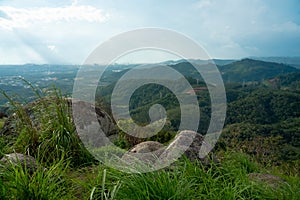 Broga Hill mountain summer landscape. High hills covered with green grass and rocks. Broga Hill, Malaysia