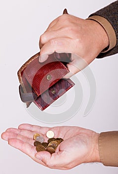 Broke businessman with empty wallet and polish coins