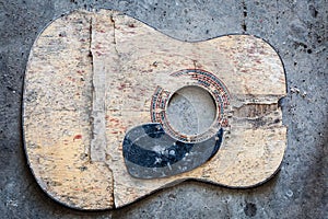 Broken acoustic guitar