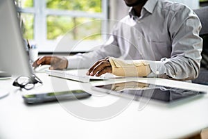 Broken Arm Office Accident. Worker Compensation