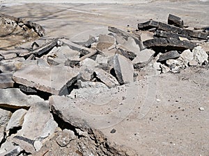 Broken ashphalt on the road restoration