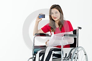 Broken Asian woman with arm sling sponsored in her hands sitting