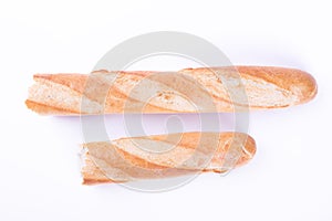 Broken baguette on white background