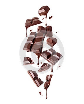 Broken bar of dark chocolate with dripping drops in the air isolated on a white background