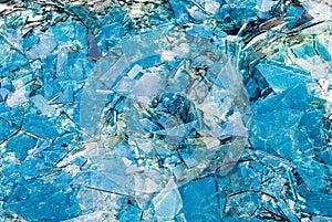 Broken blue glass background