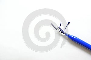 Broken blue marker on a white background