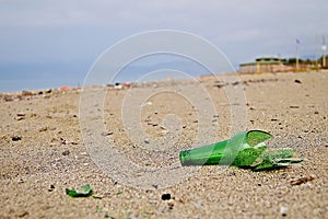 Broken bottle on the beach