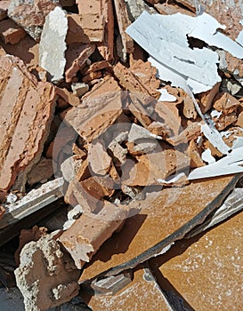 Broken bricks at the construction site, building and construction industry