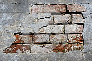 Broken bricks wall with sharp texture