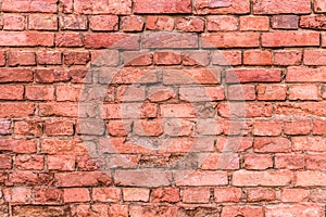 Broken brickwork from old red brick