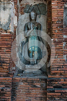 Broken buddha statue, taken outdooor in afternoon
