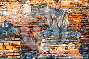 Broken buddha statue, taken outdooor in afternoon