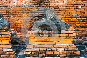 Broken buddha statue, taken outdooor in afternoon