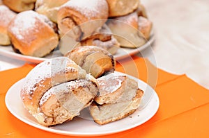 Broken bun on a white plate