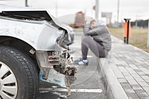 Broken car after the accident in foreground