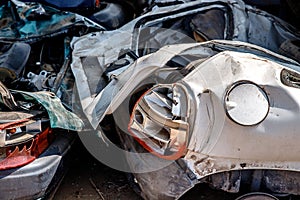 Broken car after an accident on highway, big collision road autobahn. Concept auto recycling