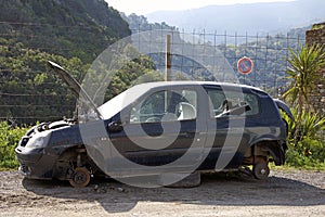 A broken car on the road