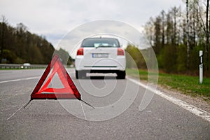 Broken car on a road side