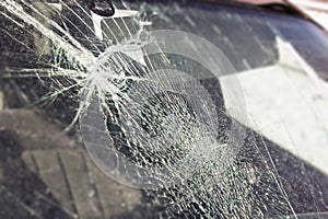 Broken car window, an accident on the road. Safe movement.