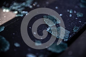 Broken car window after a break-in