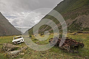 Broken cars near the pass Katu-Yaryk in the Altai Republic, Russ