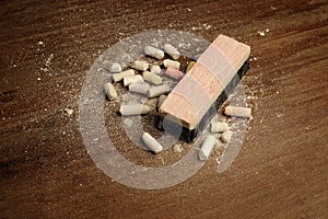 Broken chalks and duster