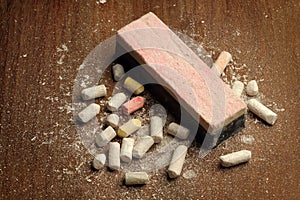 Broken chalks and duster