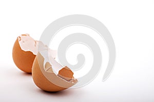 Broken chicken egg shell on white background