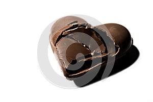 Broken chocolate hearth isolated on white backgroun