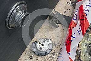 Broken combination lock on the safe closeup. Police tape. Conc