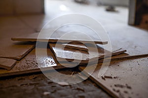 Broken and complete tiles when floor tiles are laid in a house renovation site