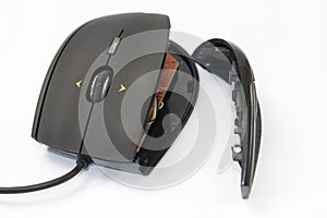 Broken computer mouse on the white background