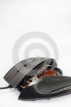 Broken computer mouse on the white background