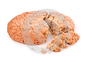 Broken cookies on white background