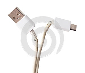 Broken cord on USB plug isolated on white background. Macro