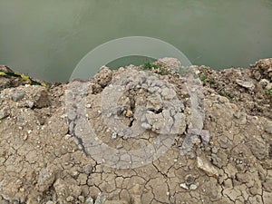 a broken country road. muddy road