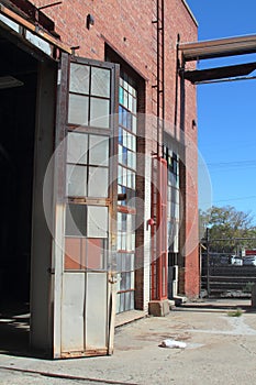 Broken and cracked industrial windows in metal frames photo