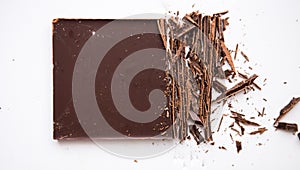 Broken craked chocolate parts isolated on white background