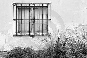 Broken and damaged window in an old house