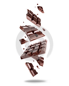 Broken dark chocolate bar in the air isolated on a white background