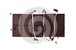 Broken dark chocolate bar on white background