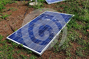 Broken destroyed cracked hole in solar panel or Broken destroyed cracked hole in solar panel after hailstorm