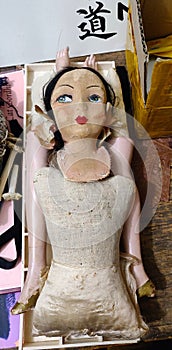 Broken dismantled antique cloth doll