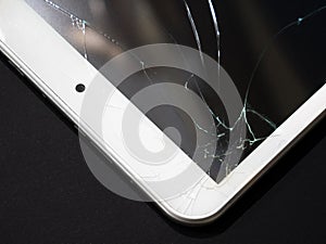 Broken display. Cracked glass tablet, device