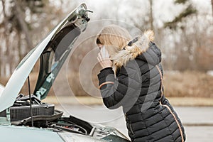 Broken down car, woman calling to somebody