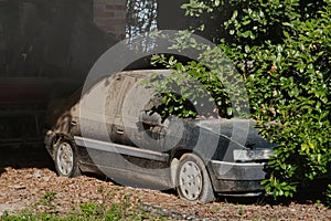 Broken Dreams, discarded car. Rusting hulk. Reclaimed by nature.