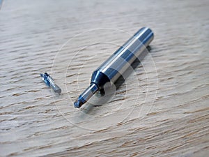 broken drill bit. broken cnc tool. close-up