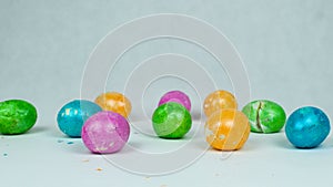 Broken dyed and colored eggs after Traditional Easter game tapping competition during Christian holiday Pascha or